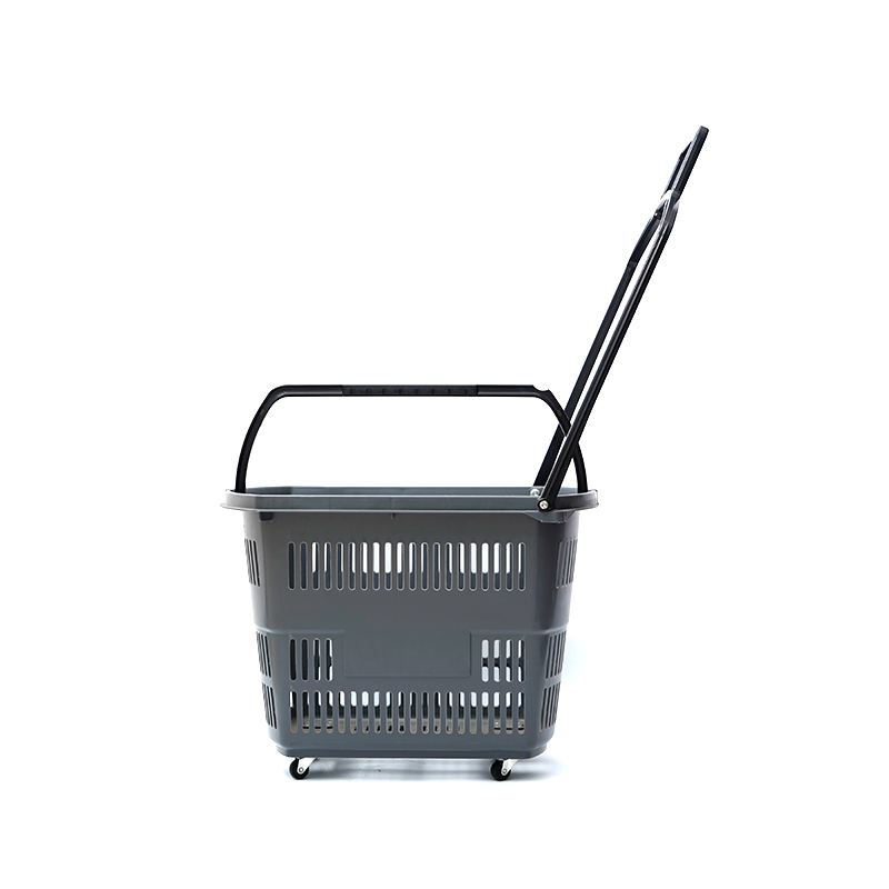 Petit panier à provisions en plastique de chariot à quatre roues de supermarché